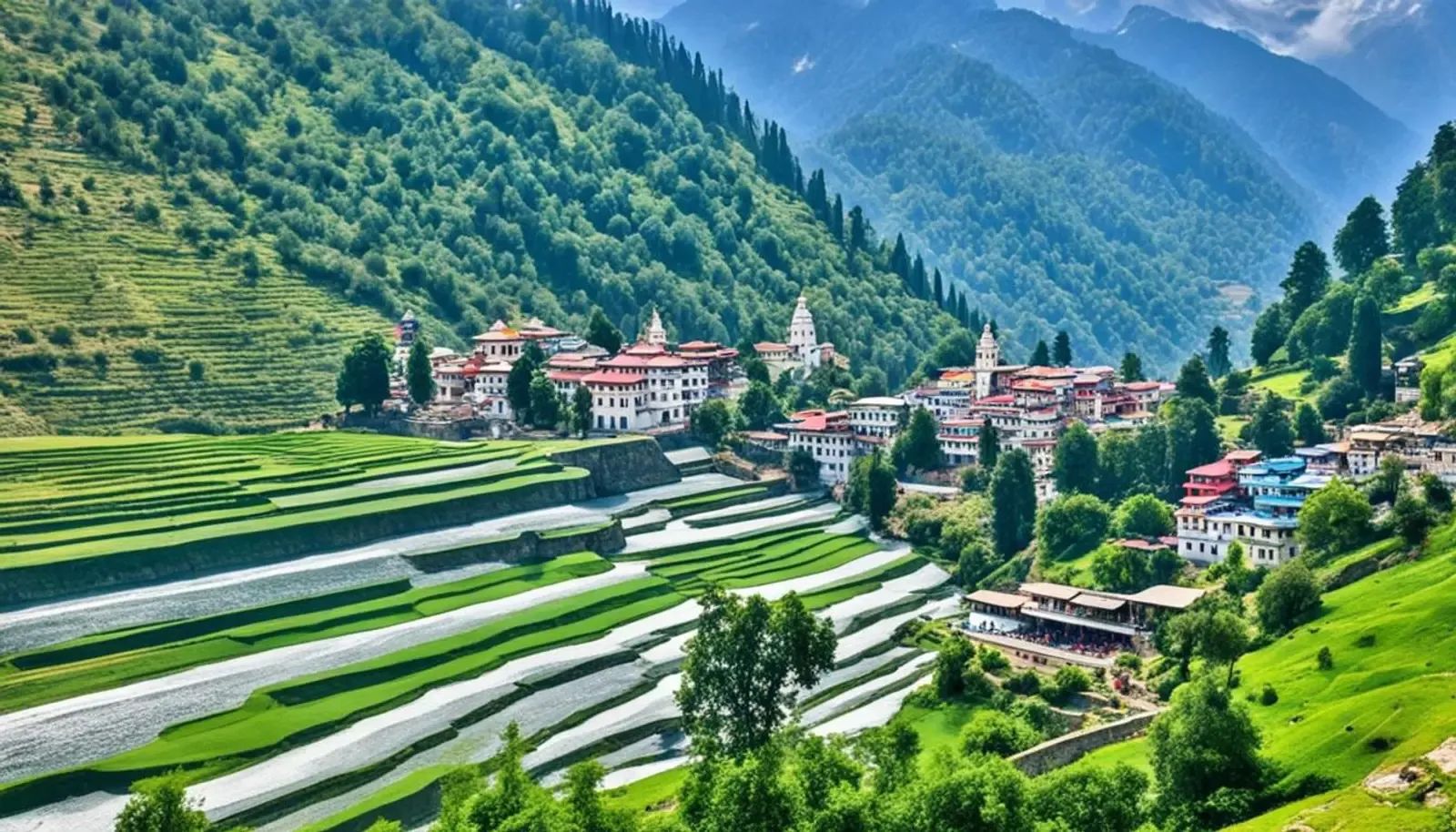 Terraced fields stepping down a green hillside with a village strung along the contour above them.